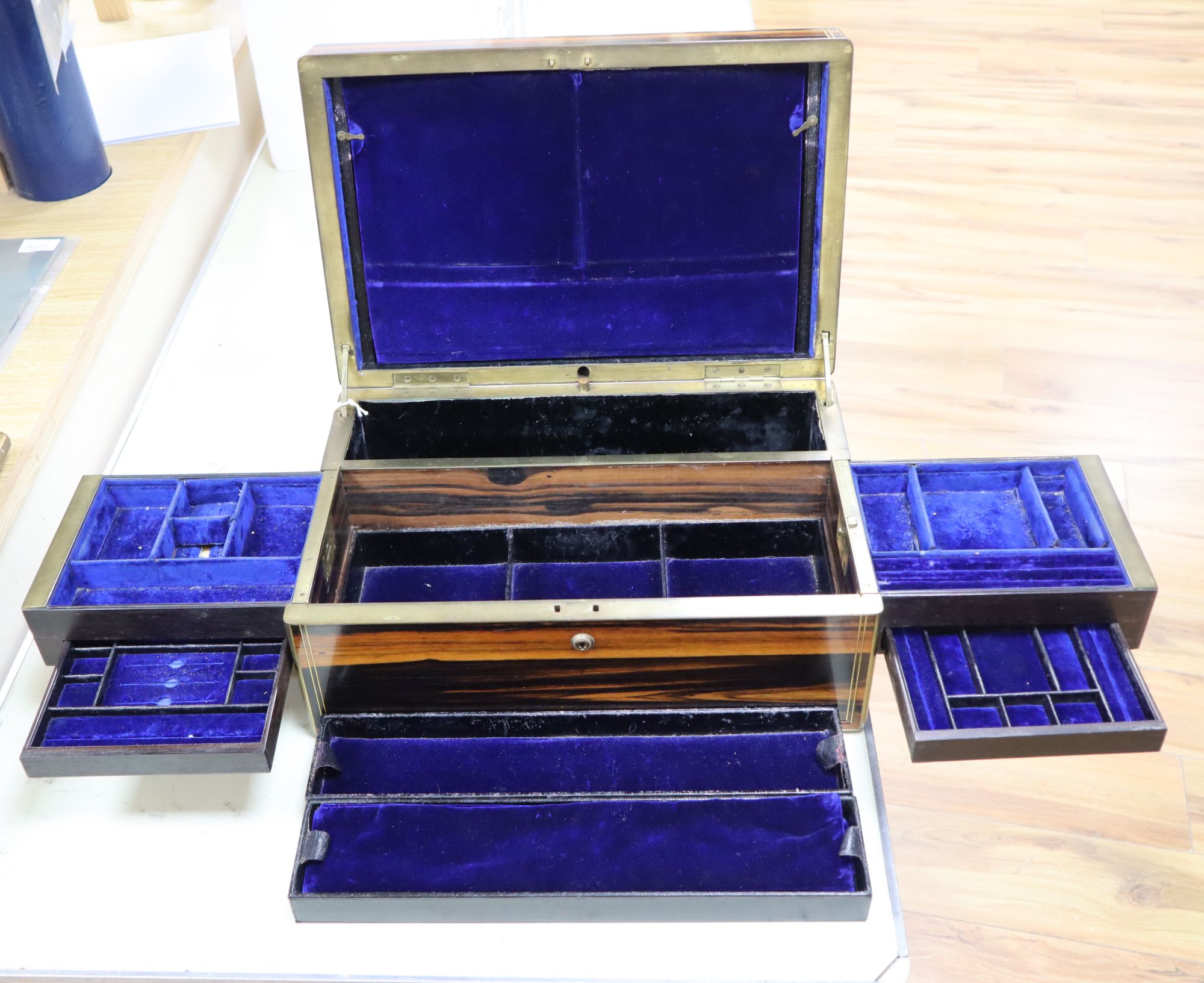 A Victorian calamander and brass-mounted inlaid jewellery box, width 42cm height 18cm